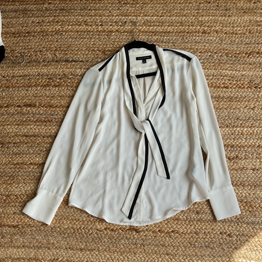 Banana Republic cream and black button down blouse with striped tie